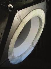 (a) layer of insulation material; (b) insulation before taking off the compression tape; (c) completed
