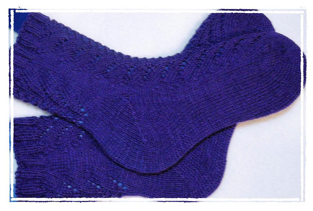 Spiraling Eyelets Toe-Up Socks (This pattern assumes that you have some working knowledge in sock knitting, and probably is not for beginner sock knitters.) You will need US size 2 needles.