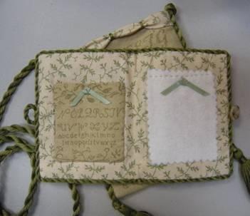 On the right above, "Winter is Past" ($14), model stitched on 36c linen with Au Ver A'Soie silks. A lovely design to choose for your winter stitching to "pretend" that it's past!