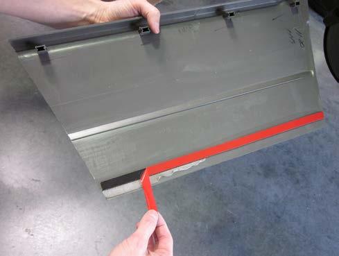Hold cladding in place on vehicle and re-attach by pressing firmly