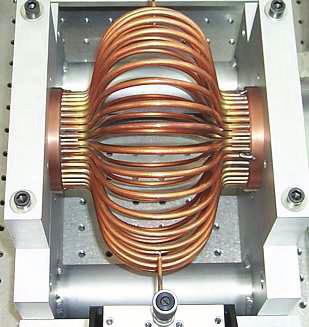 THP026 Figure 1: 40 tube copper TESLA cage cavity in a network analyzer test station. Figure 2: Model of a 72 tube interleaved TESLA cage cavity.