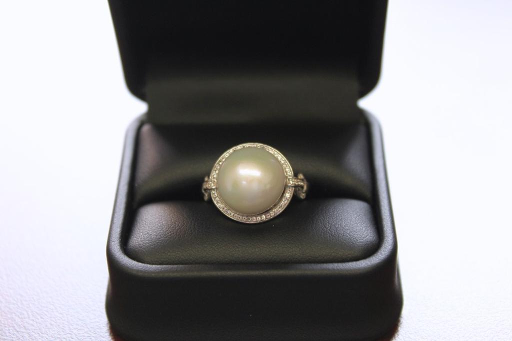 Jewelry Raffle Sterling Silver Windsor Fresh Water Pearl & White Topaz Ring Tickets for sale at Circle of Care for