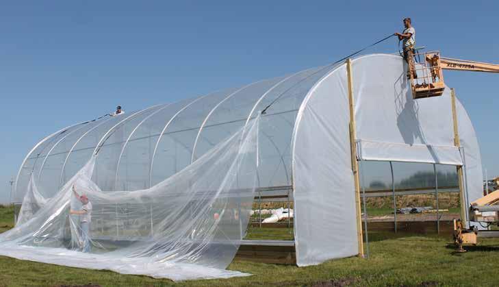 Install Second Layer of Cover Film Once air inflation kit (or kits) are installed, install remaining layer of greenhouse film. Simply repeat cover installation steps for your greenhouse.