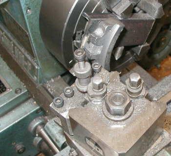 This photo shows machining one side of a shoe. The part adjacent to the wheel is not machined in this step.