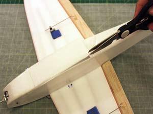 Trim off the 1/8 strip so that the tape will not cover the