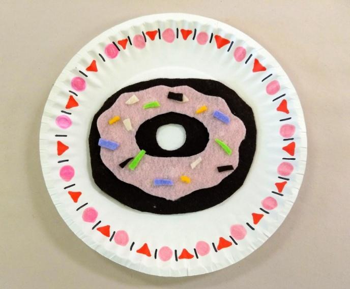 Permanent Collection Dazzling Donuts: Low Relief Sculptures Grade Level: Pre-K Materials: Felt Glue Paper Plate Markers Stickers About the Project: Students will look at images of still life