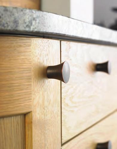 We designed this door with large shaker styles with an inside chamfer which complements the timber and are perfectly matched with American copper knobs.