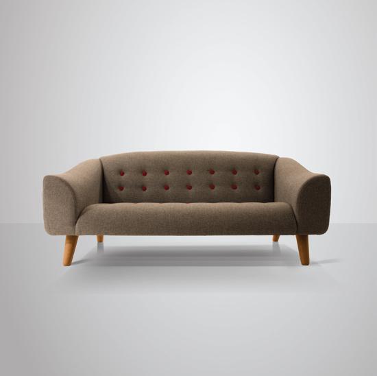 Tilly. A contemporary upholstered sofa with button detailing, solid beech frame and a sprung seat and back.