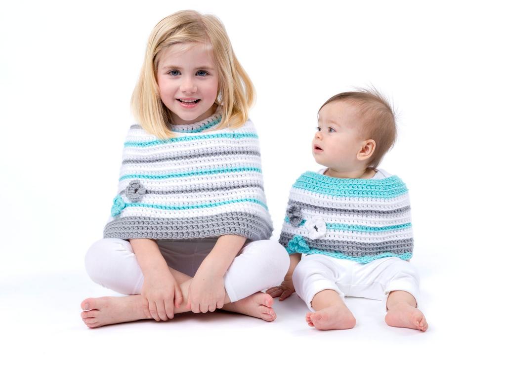 PROJECTS Poncho Pleasure for Baby and Child Crocheted in the round in stripes and embellished with sweet flowers, this shoulder-warming poncho is the perfect
