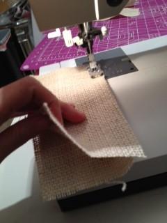 [13] Next take your four bigger pieces and sew the long edges