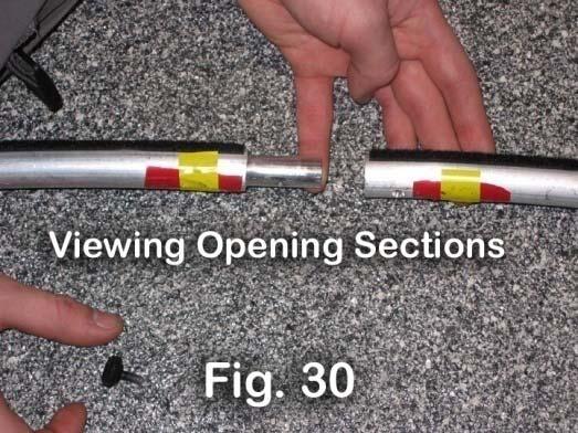 secure it (Fig. 28). Place each of 10 color coded sections of pipe on each T Connector. (The color code corresponds with the sections you just assembled.