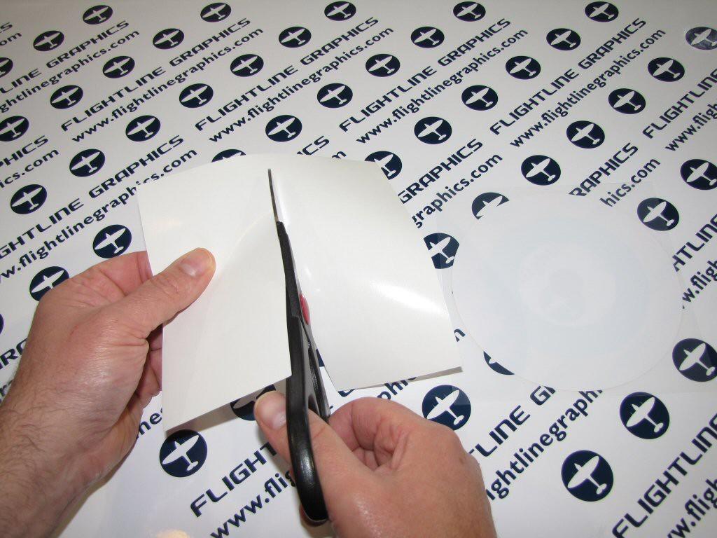 To start lay the decal face down on a CLEAN work surface. Holding the application film down peel off the backing silicone paper completely.