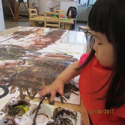 Such as finger painting and how the different ends of the feathers make different marks on the paper.