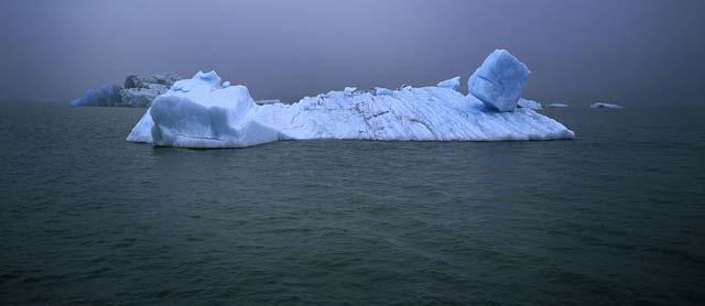 Icebergs have farther to travel before crossing moraine, so more opportunity to melt.