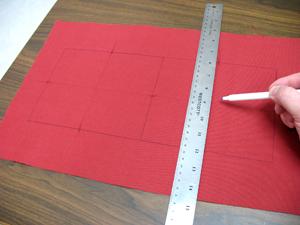 Leave a couple of inches of excess fabric around the shapes.