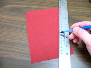 Pin in place and sew a 1/4 inch seam around the side and bottom edges only. Now we will prepare the scissor pocket.