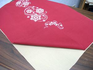 Prepare the lining of the pocket by cutting another piece of the solid-colored canvas 20 inches wide by 26 inches high.