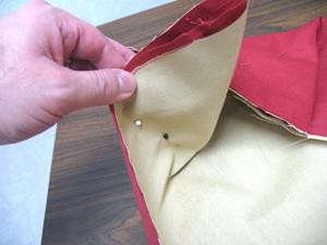Pin the corners in place on the lining side.