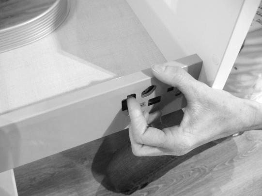 2) Pull out the drawer by pulling it towards yourself and upward, keeping pushed