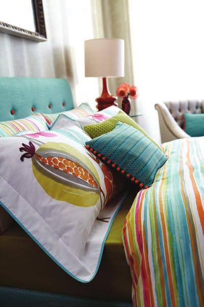 The duvet cover and oxford pillowcase features a large all-over floral, in a delicious combination of bright colours, accented by