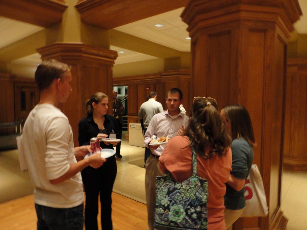 Figure 9: Erik Hall talking with students and other