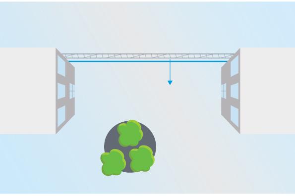Configure the Application In scenario A, the camera monitors a fence where a container is placed just inside the fence. Draw the line inside the fence, on the ground and close to the fence.