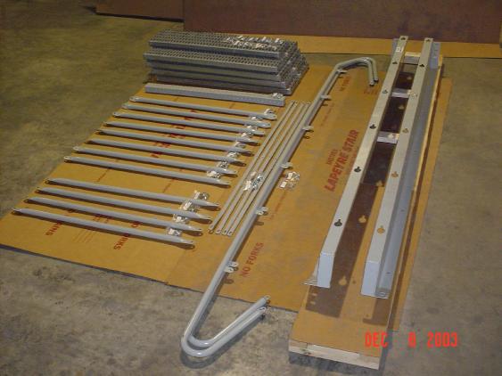 3) Unload and handle material in a manner that will not strain, bend, deform or otherwise damage it.
