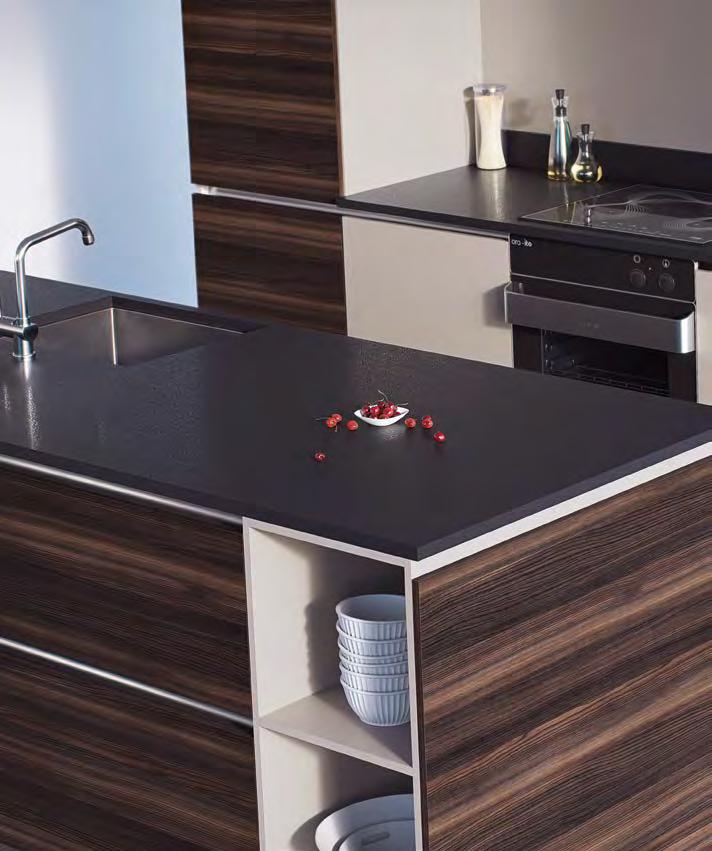 This thin, sleek top provides an ideal base for a trendy kitchen such as this.