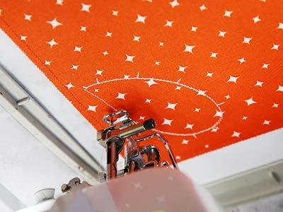 For the raw edge applique pieces, embroider the dieline and locate the