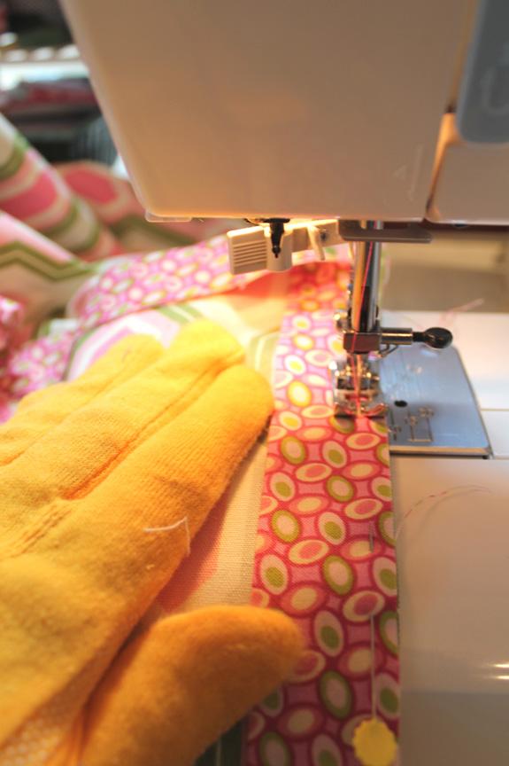 You should see a fold in the binding that runs diagonal to the side of the blanket you are working on. 10.