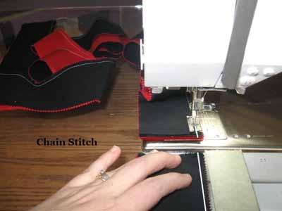 Place the Red and Black strips with right sides together and stitch a 1/4" seam along the edge aligning as you stitch. And if the ends don't line up perfectly, no worries.