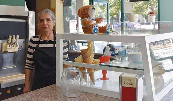 C O M M U N I T Y Yogurt Stop owner plans retirement By Kate Bradshaw Almanac Staff Writer After more than 30 years behind the counter, gracefully topping swirls and dollops of frozen yogurt with
