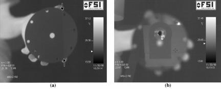Figure 5. a) Sandblasted and then etched side of a copper disc as seen by IR camera. Arrows denote a chord on the right side of the disk that was re-sandblasted after etching.