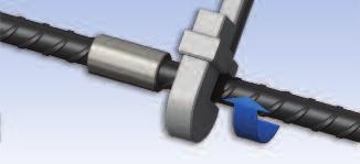 Using a wrench, rotate the continuation bar to lock the two bar ends against each other within the coupler.