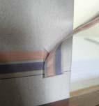 Folded corner: About 3/4 before the door, make a turn upward. To do this, fold the tape, sticky side out, 90 in the opposite direction from where you want to go - in this case, the first fold is down.