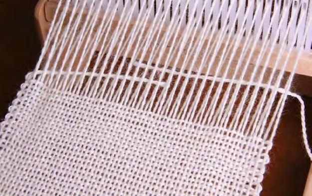 Weave 3 rows in plain weave.