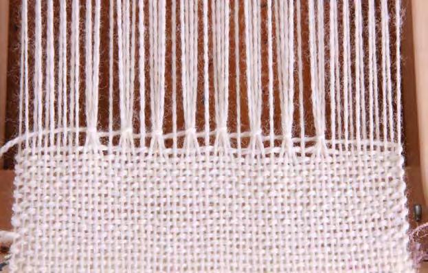 Weave 20 rows in plain weave.