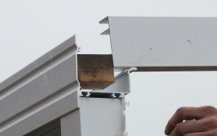 Fit the end glazing bars (from gutter to wall plate) & check levels.
