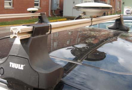 The image below is a picture of the actual Thule mount, bar, and an antenna. The mount points are labeled.