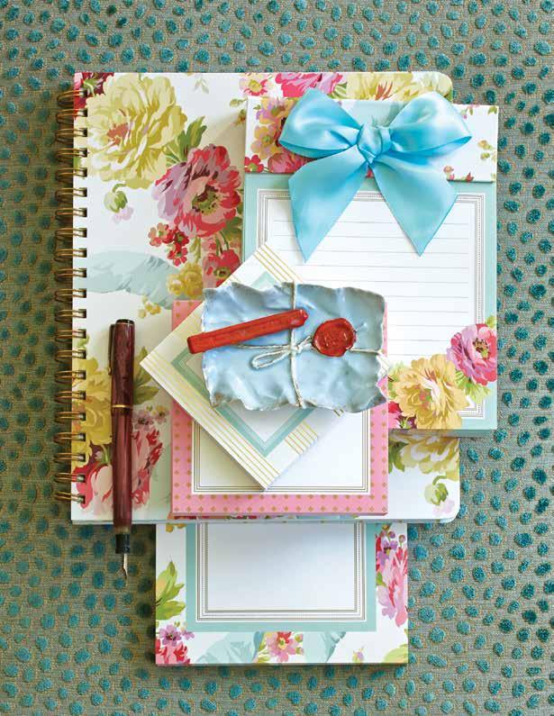 Social Stationery Our Rose Ribbon stationery collection features bright displays of garden roses wrapped in a French blue ribbon.