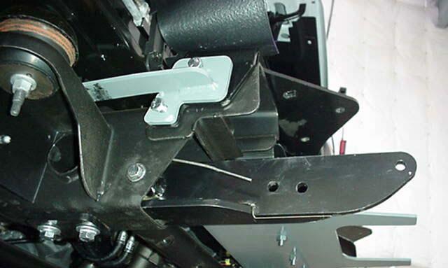 Do not tighten the bolt all the way. Install the Frame Extension as shown in Figure 4. Use the Support Plates underneath the frame with the slots towards the rear of the vehicle.
