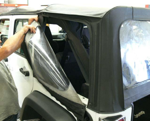 REMOVING EXISTING TOP Unzip and remove left and right rear quarter windows from vehicle.