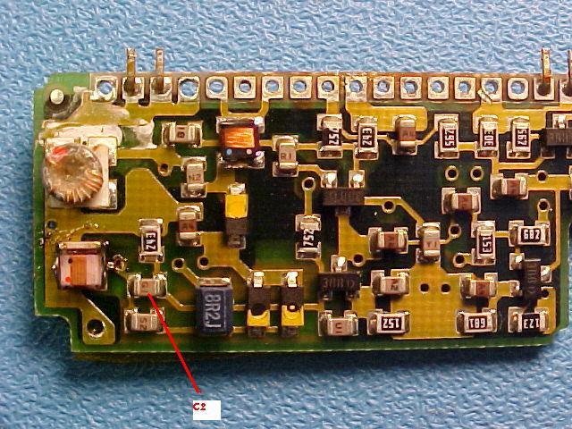 11. Refer to figure 10. Remove the capacitor at the location labeled C2 and replace it with a 0805 size 18 pf chip capacitor. Figure 10. C2 location. Replace with an 18pF chip capacitor.