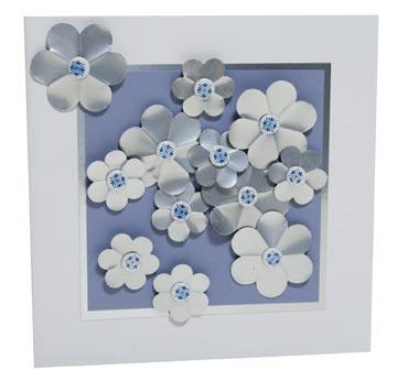 Flower Trio Mike punched three 1½" circles, evenly spaced, from a 2" x 6" strip of white cardstock. He adhered that to a 4" x 6" folded card.