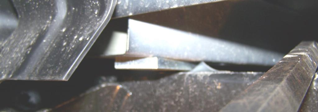 12B) Use pry bar to raise truck bed enough to temporarily insert spacer plate (#10) in