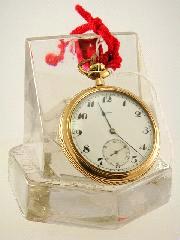 Lot # 479 479 480 481 482 483 484 485 486 Lot # 491 Avon gold-filled pocket watch with cast glass holder.