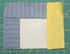 Place R/S down on one side of the square. Stitch in place using ¼ S/A. Open out.