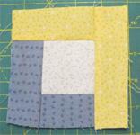 Attach another strip of the same colour to the next side. Open out. 4.