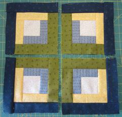 Four Log Cabin Blocks in a Square 1. Cut one 2½ square for the centre.
