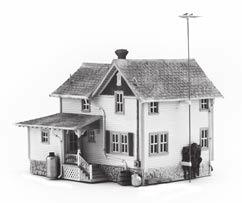 1:87 BUILDING KIT CORNER PORCH HOUSE PF5196 Two-story home with cedar-shake roof and a corner wrap-around porch.